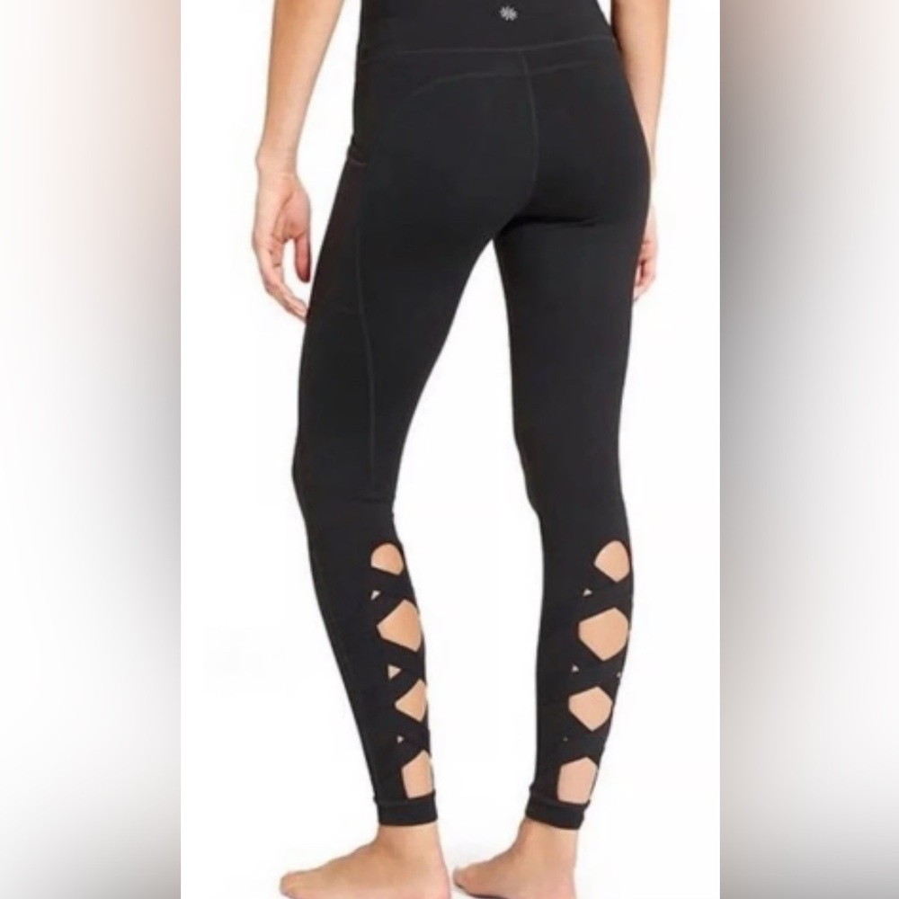 Athleta Chaturanga Black Criss Cross Lace Up Side Pockets Cut Out Leggings Small